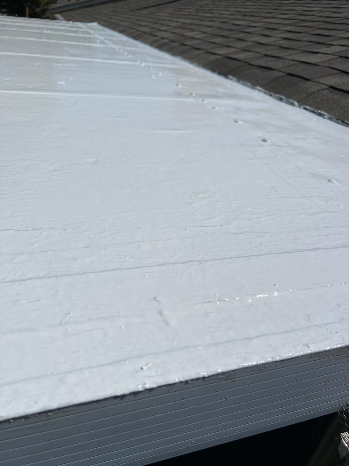 White low-slope roof surface