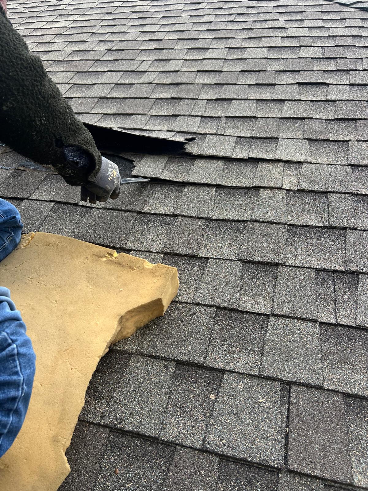 Roofer working on a roof
